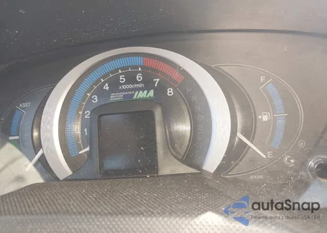 2011 Honda Insight from USA, damaged, VIN JHMZE2H36BS006488